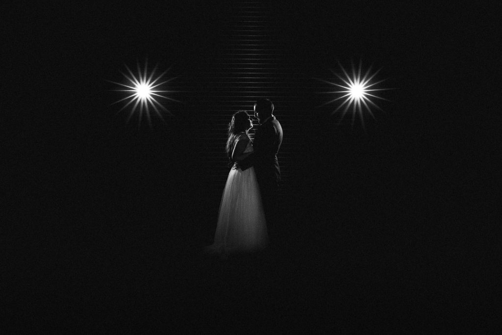 A black and white wedding photo of a bride and groom at Berts Barrow Farm Shop in Hillam, Leeds
