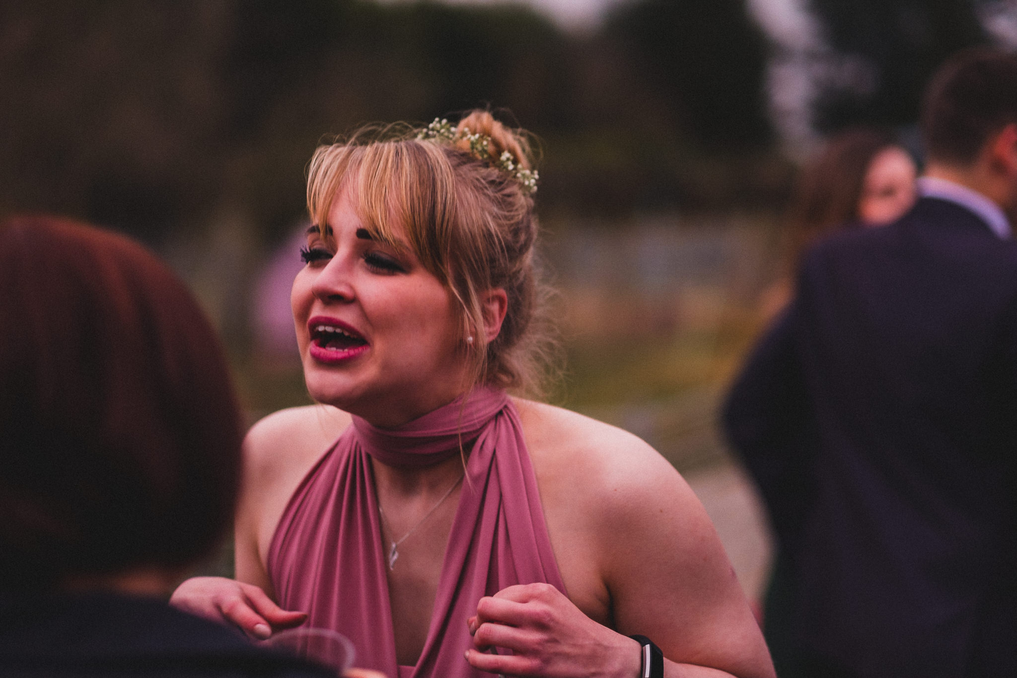 Candid laughing photo of bridesmaid